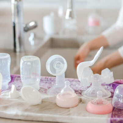 Philadelphia postpartum doula washing baby bottles